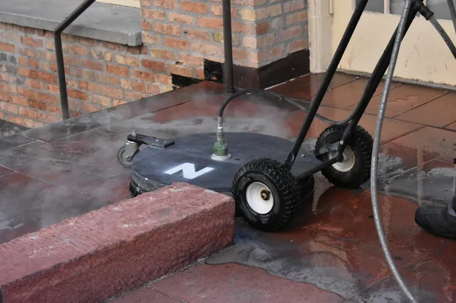 Surface cleaner deep cleaning an outdoor surface during prep
